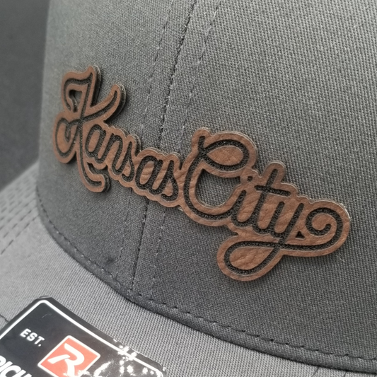 Kansas City leather lettering on adjustable trucker hat. 